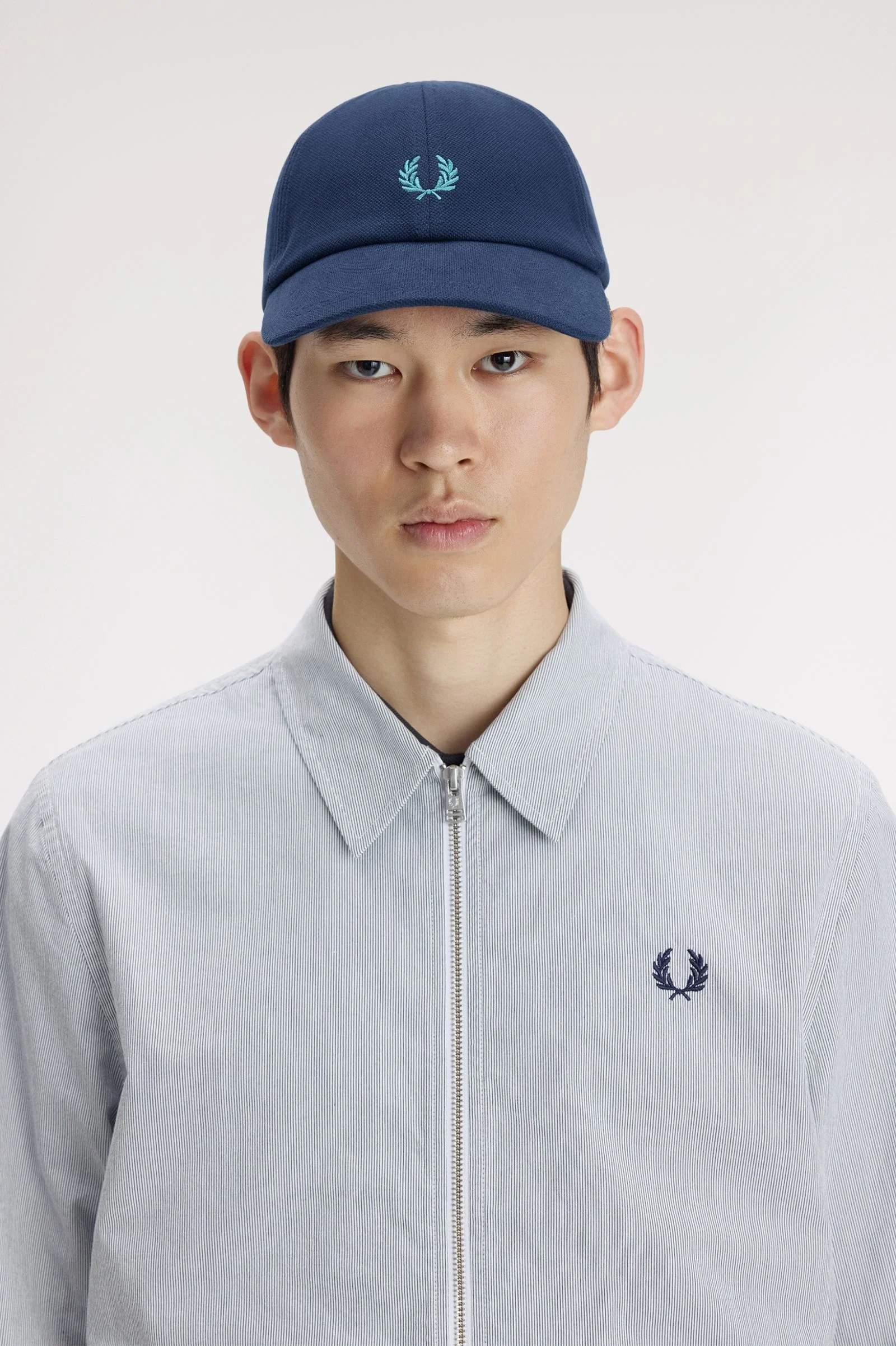 Hoeden/Petten blauw Fred Perry