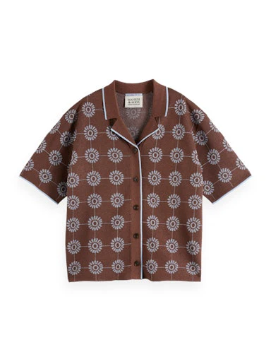 Pulls bruin Scotch & Soda