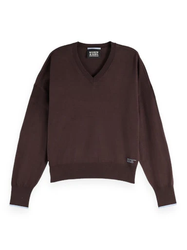 Pulls bruin Scotch & Soda